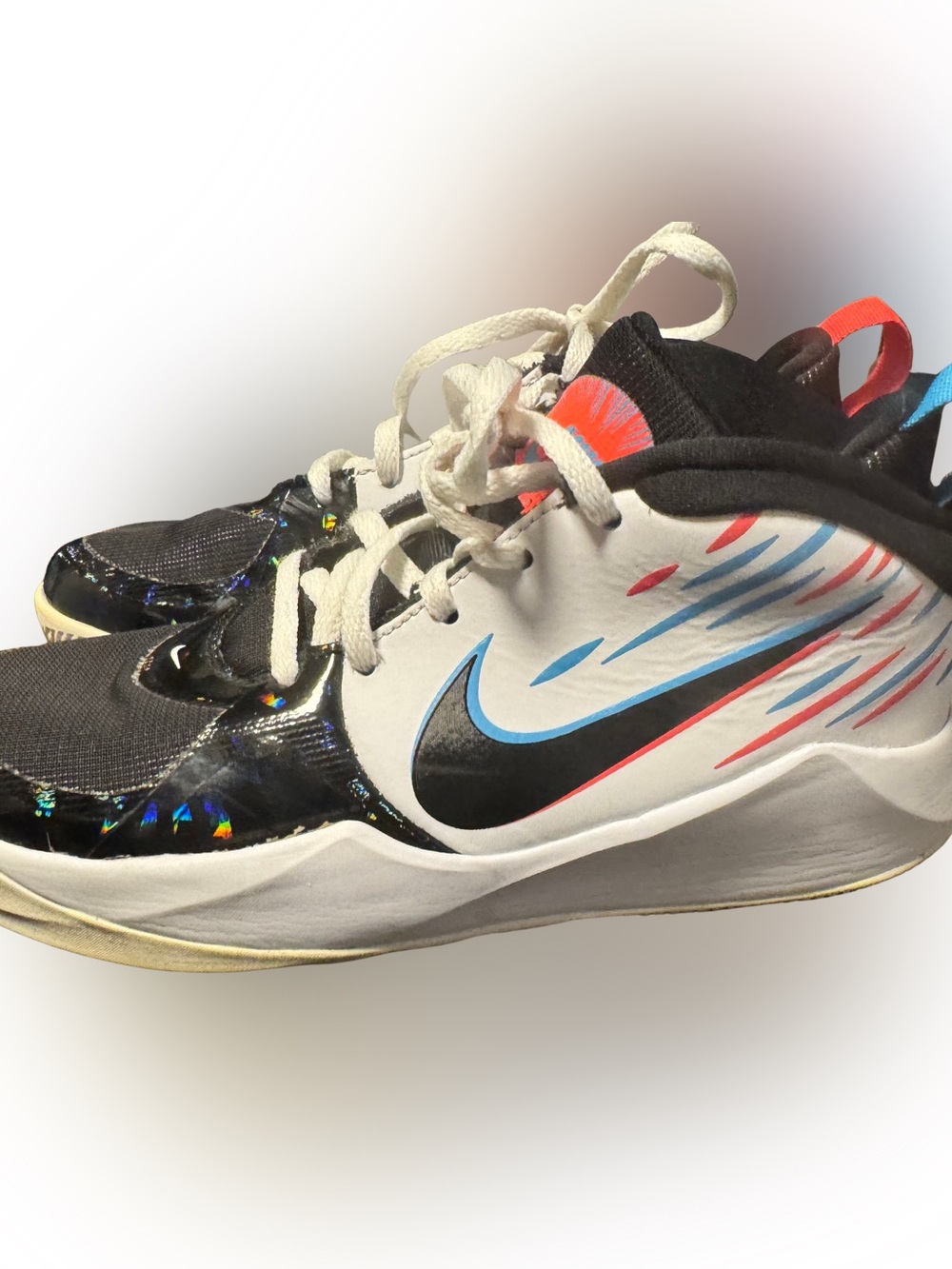Nike Kids Black and White Basketball Sneakers with Blue and Red Accents